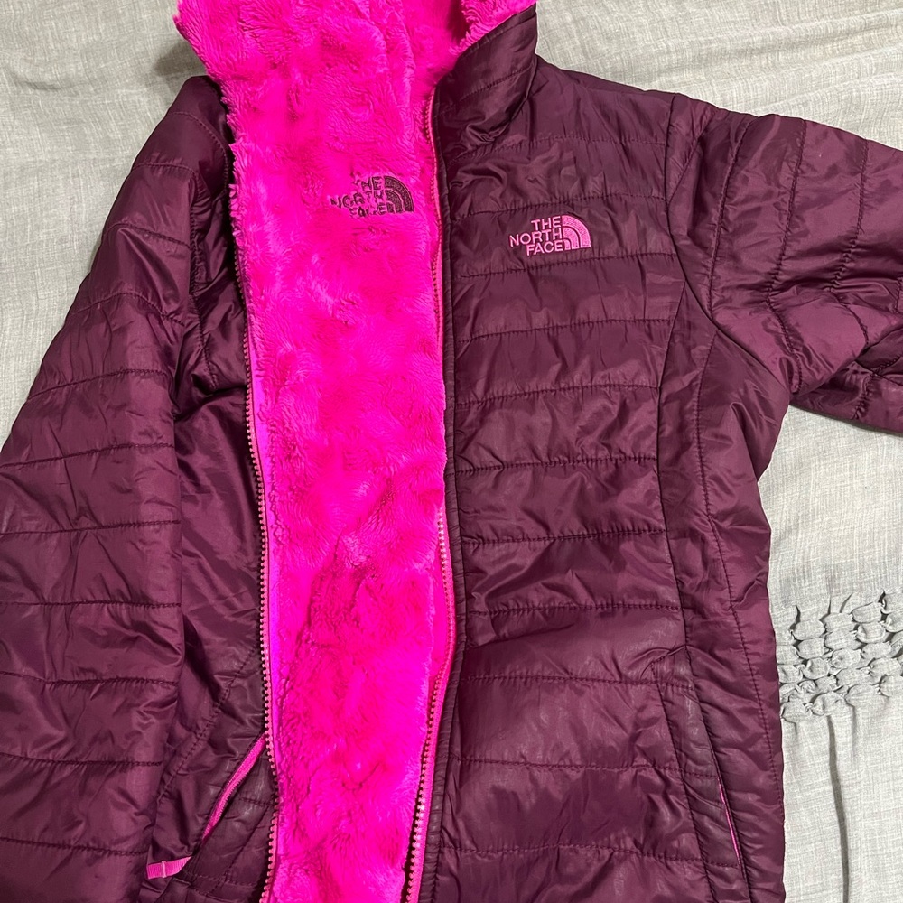 The North Face Pink double sided jacket! It has only been used twice.